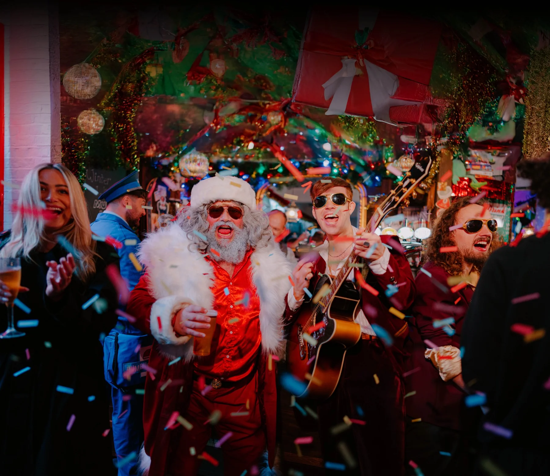 Santa celebrating with guests at Humbug
